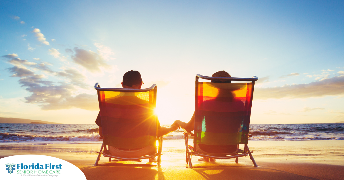 Caregiver travel hacks can help couples like this one on the beach enjoy their vacation.